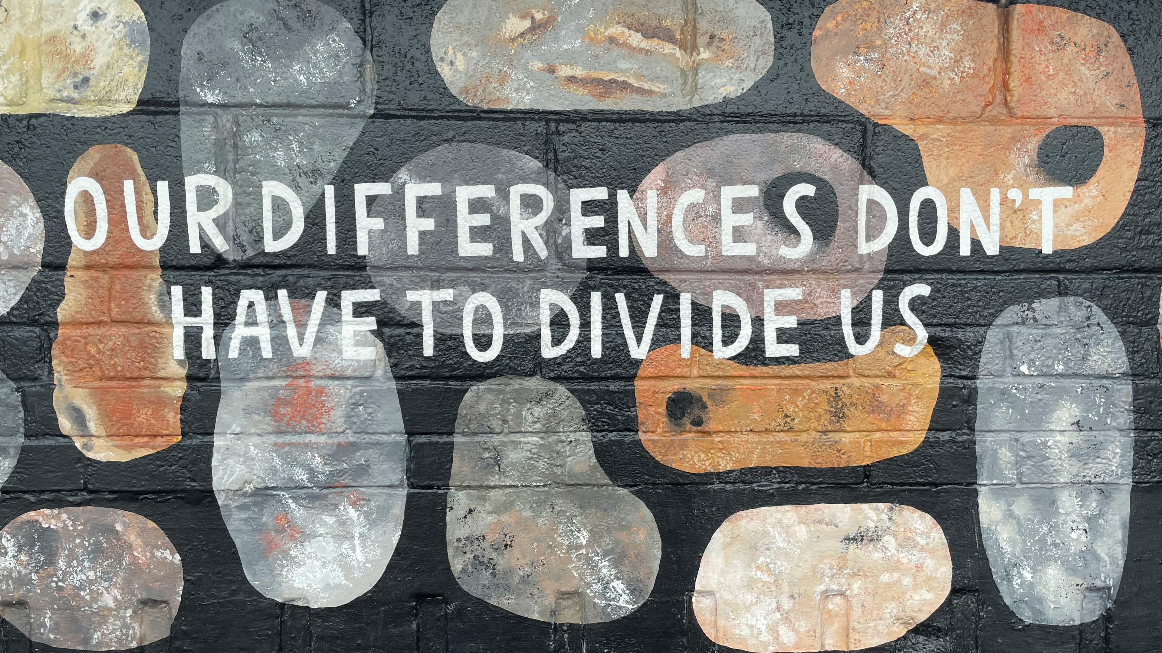 A mural reading: Our differences don't have to divide us